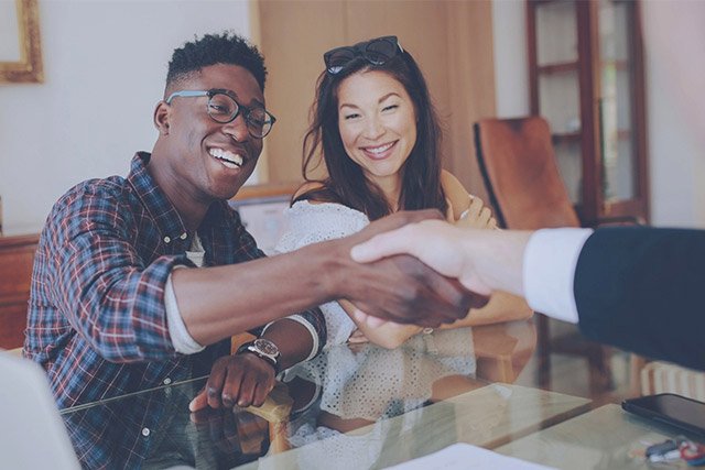 Young couple working with a bank expert