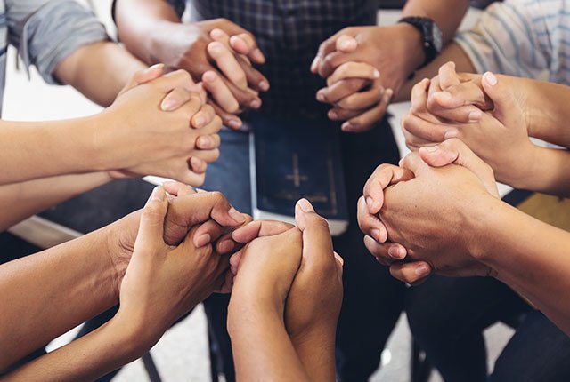 people holding hands